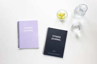 Fit en Gefocust: Hoe een Fysieke Fitness Journal je Workouts naar een Hoger Niveau Tilten